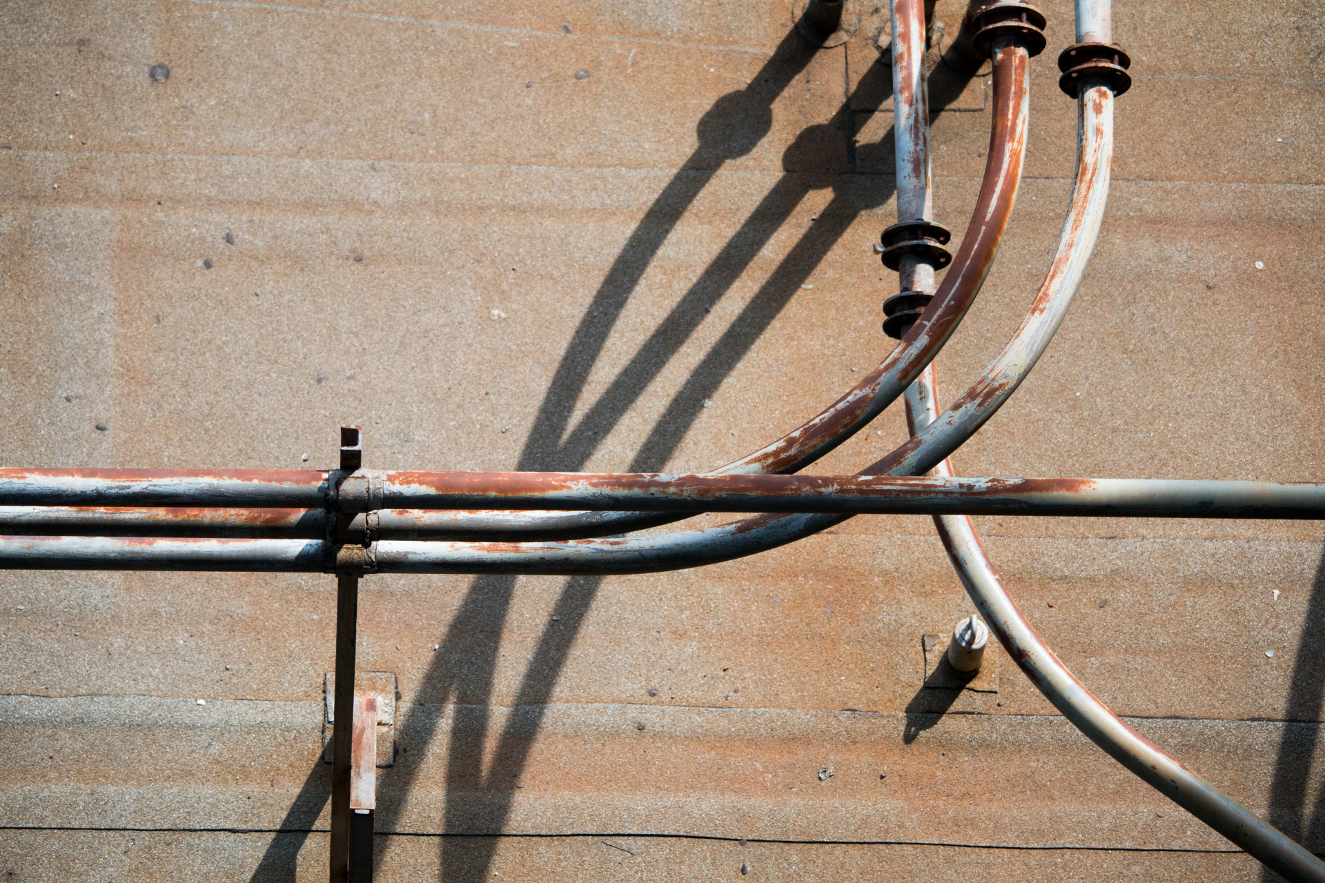 Rusty Industrial Pipes and Shadows