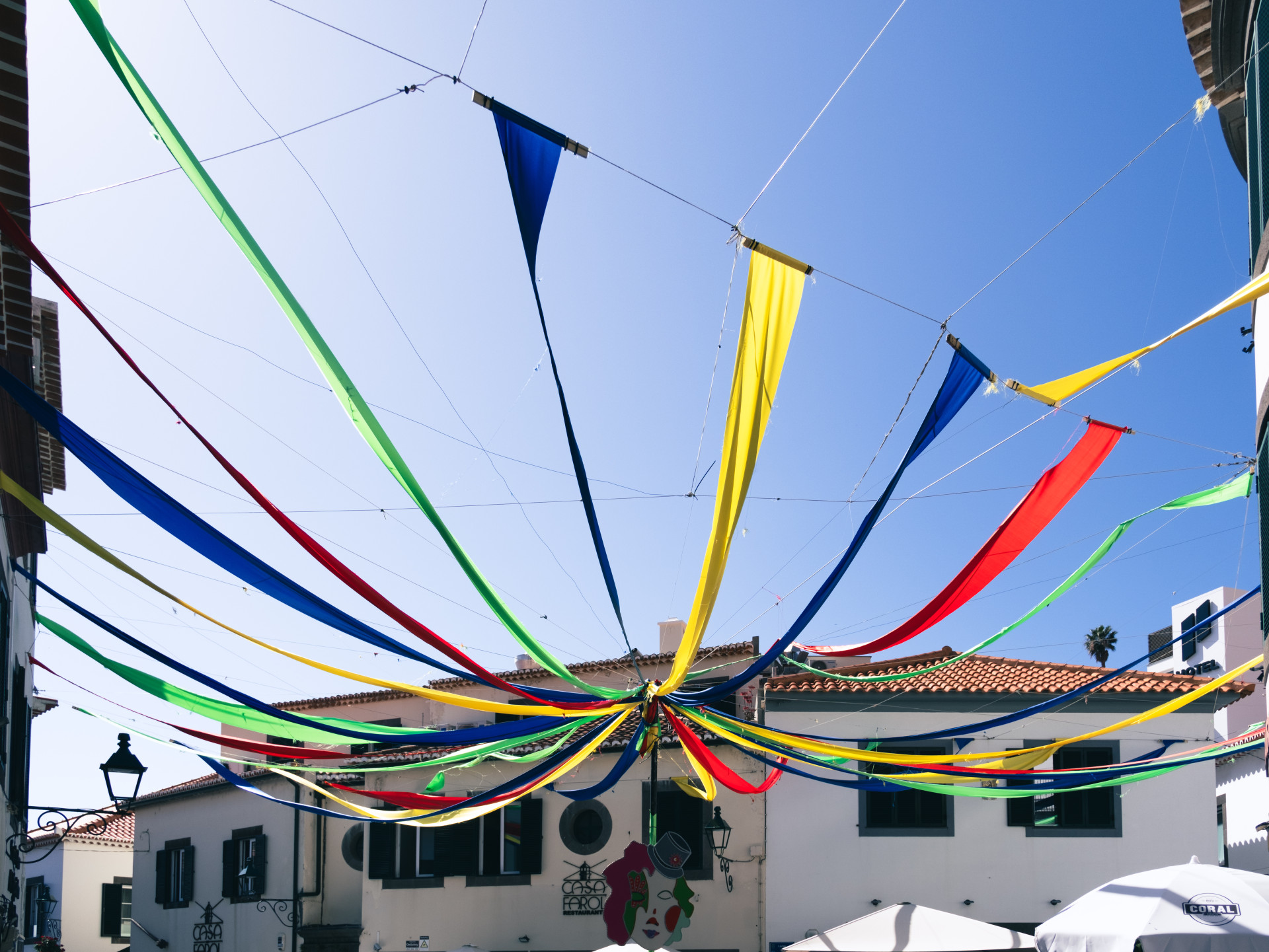 Colorful Carnival Streamers in Funchal Old Town