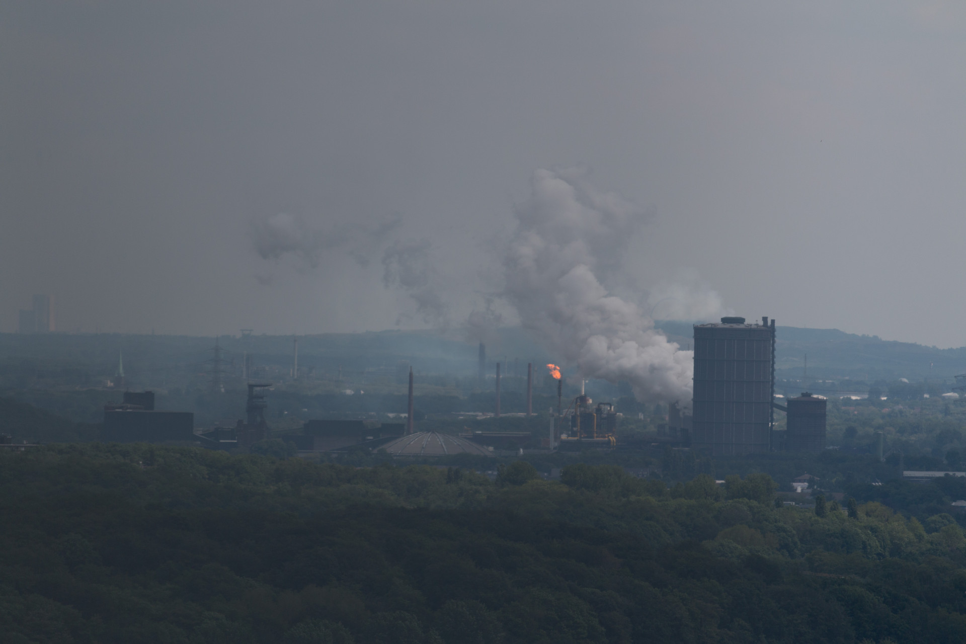 Industrial Skyline with Emissions