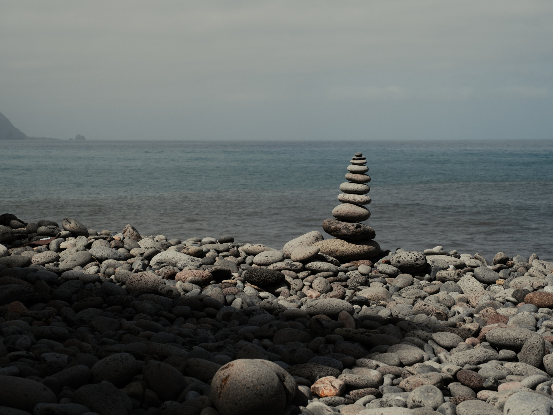 Balanced Basalt Cairn on Madeiran Coast
