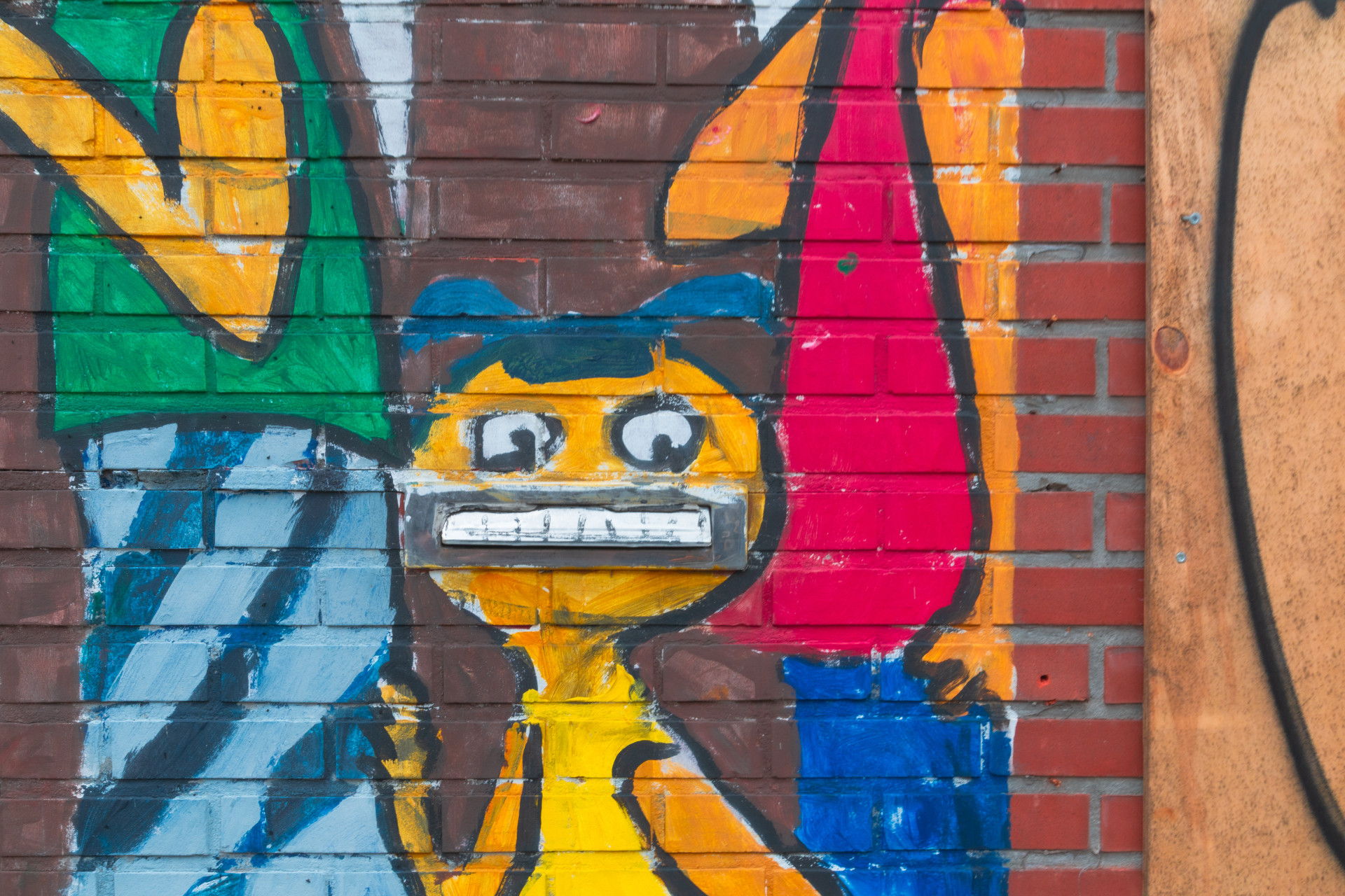 Colorful Street Art on Brick Wall