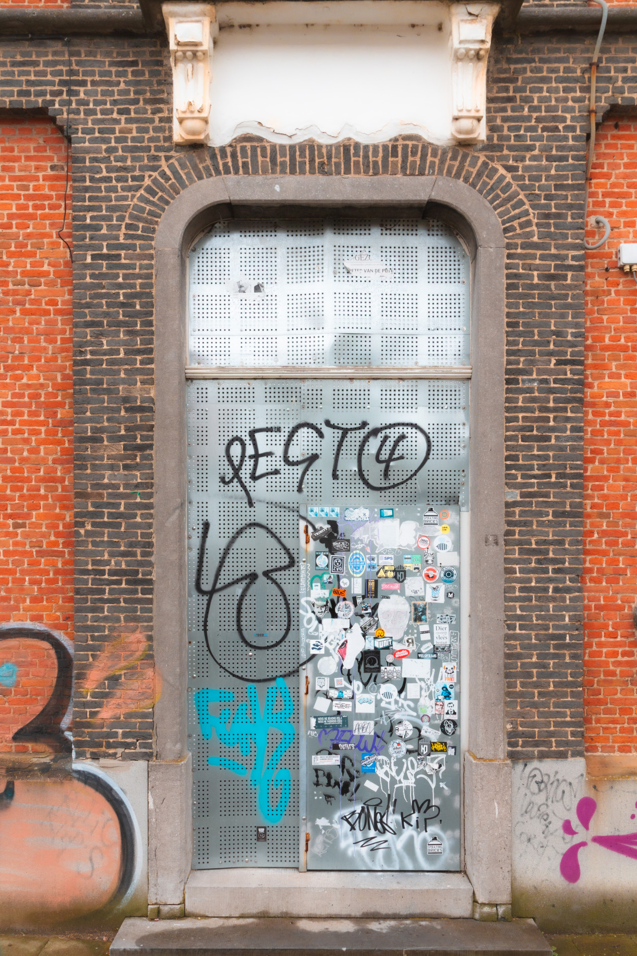 Graffiti-Covered Door in Doel