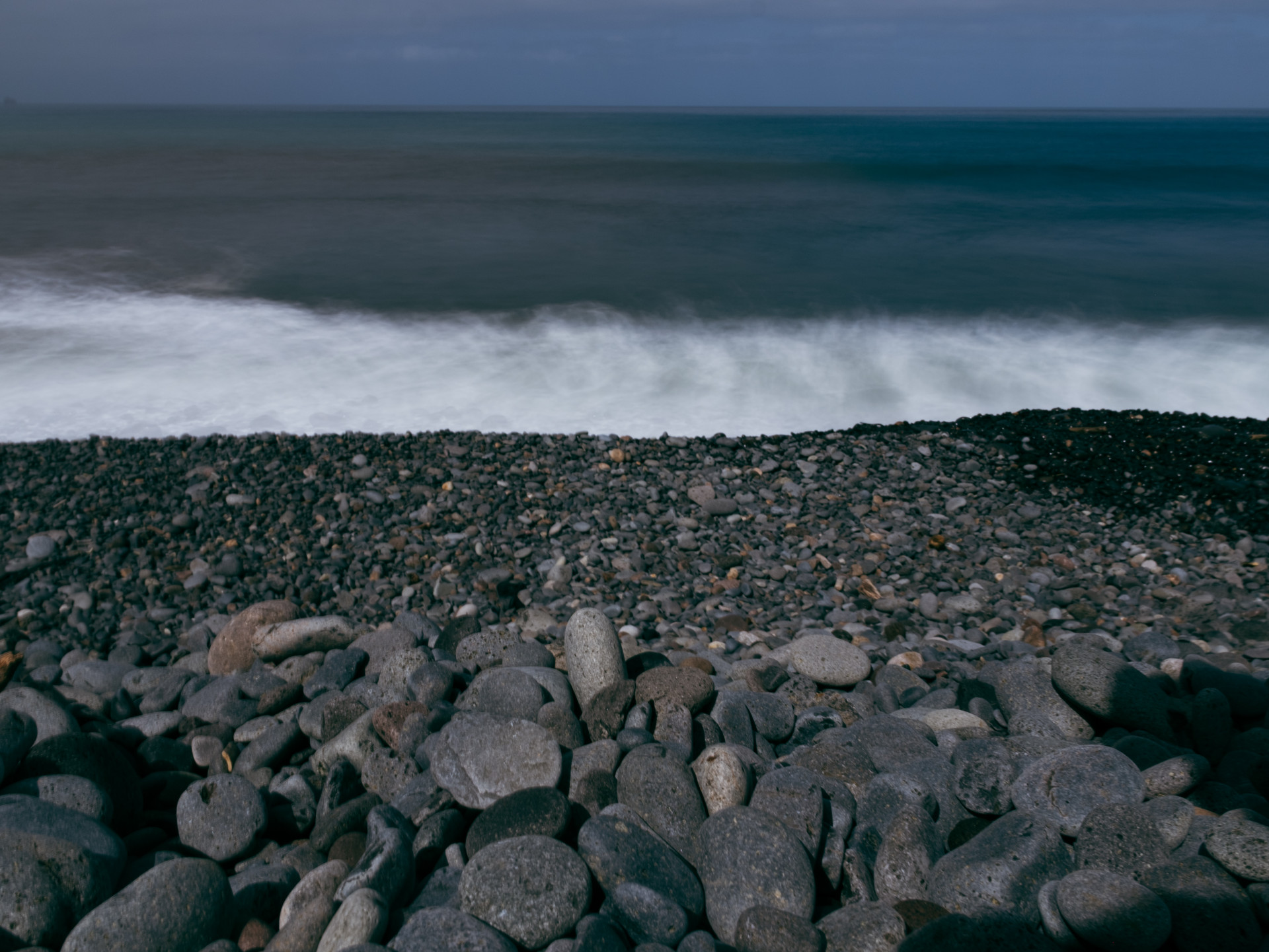 Atlantic Waves on Volcanic Pebble Beach, São Vicente