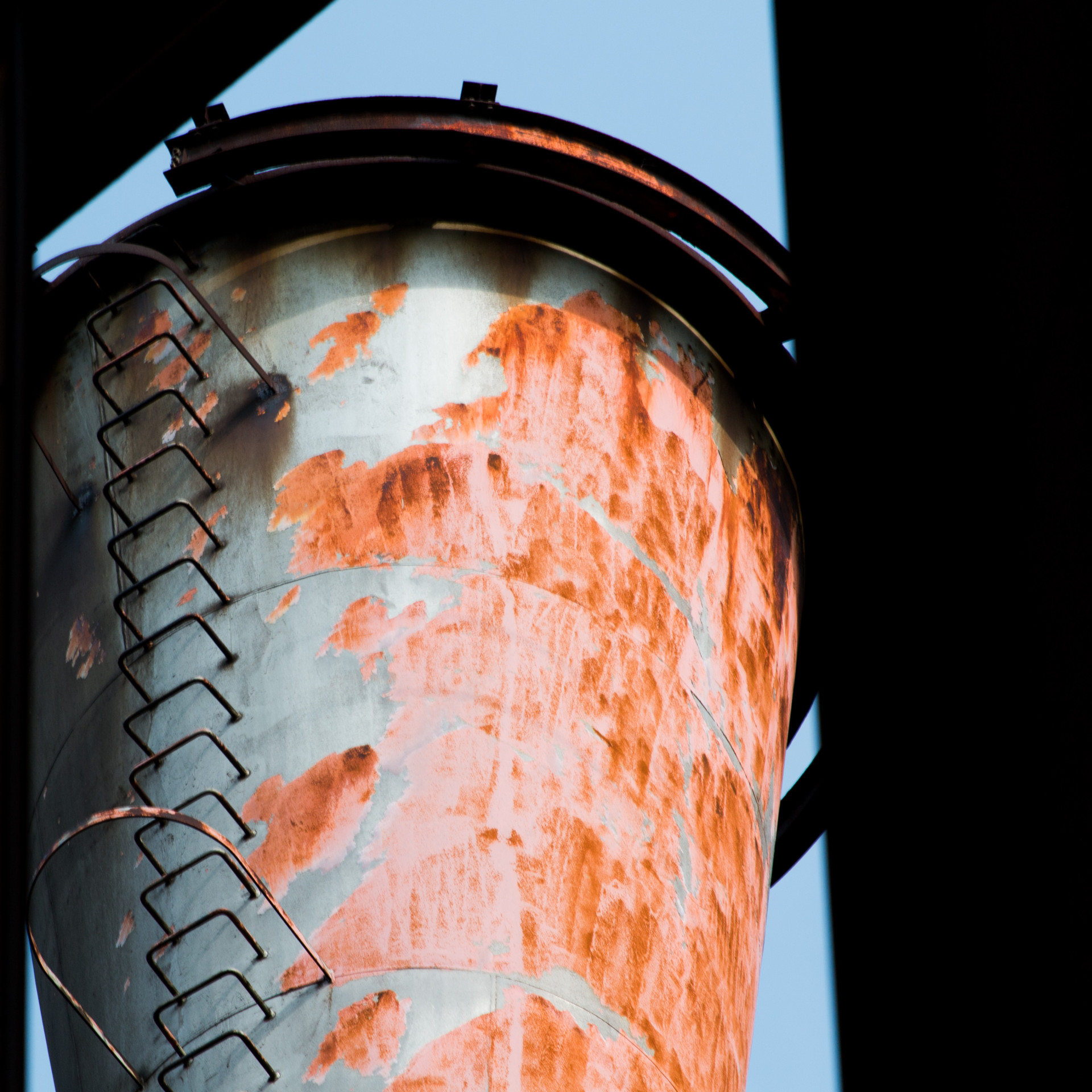 Rusty Industrial Tower with Ladder