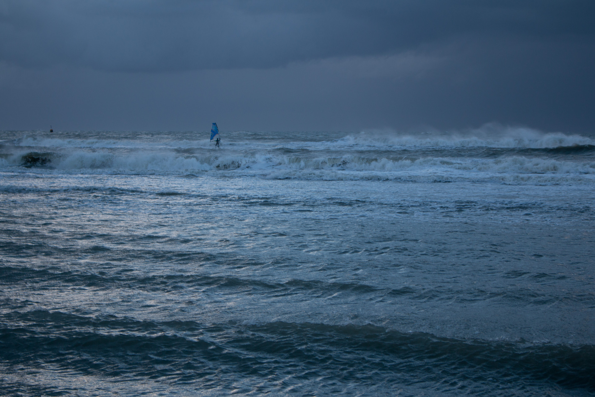 Windsurfer on Choppy Seas
