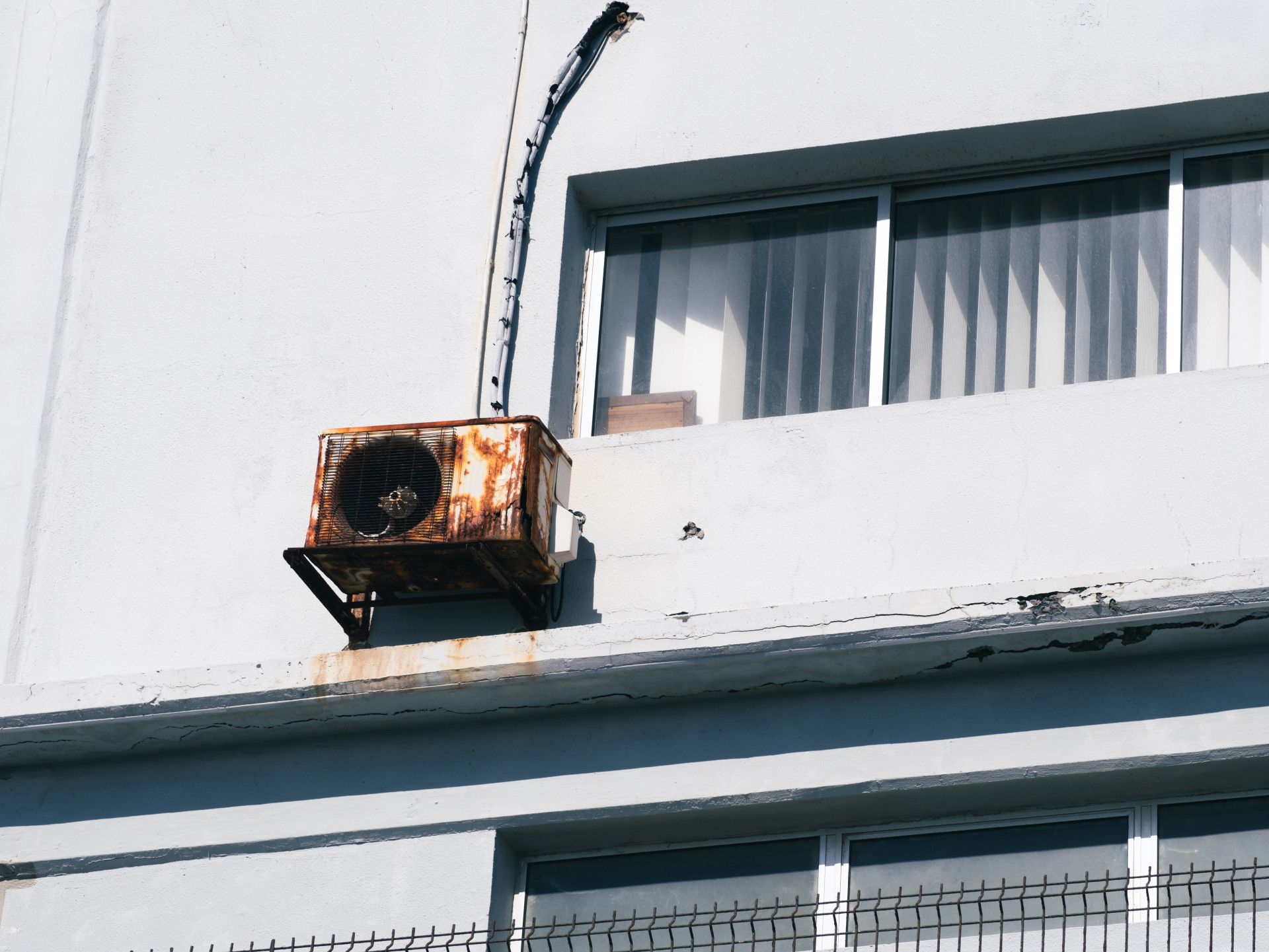 Heavily Rusted Air Conditioner on Facade, Funchal